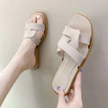 Women's cross strap PVC sandals in light blue, showing toe ring and non-slip sole.