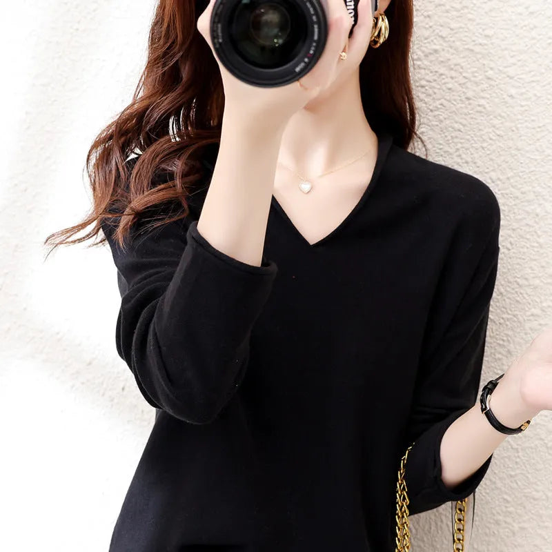 Women's V-neck long sleeve knitwear top in turmeric colour with non-ironing construction