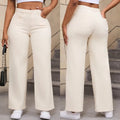 Women's high-waisted straight leg wide jeans in apricot colour on a hanger
