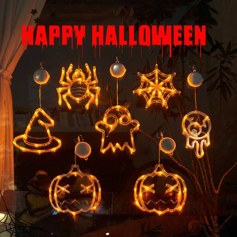 Seven Halloween LED hanging lights with spider, pumpkin and ghost designs featuring suction cups