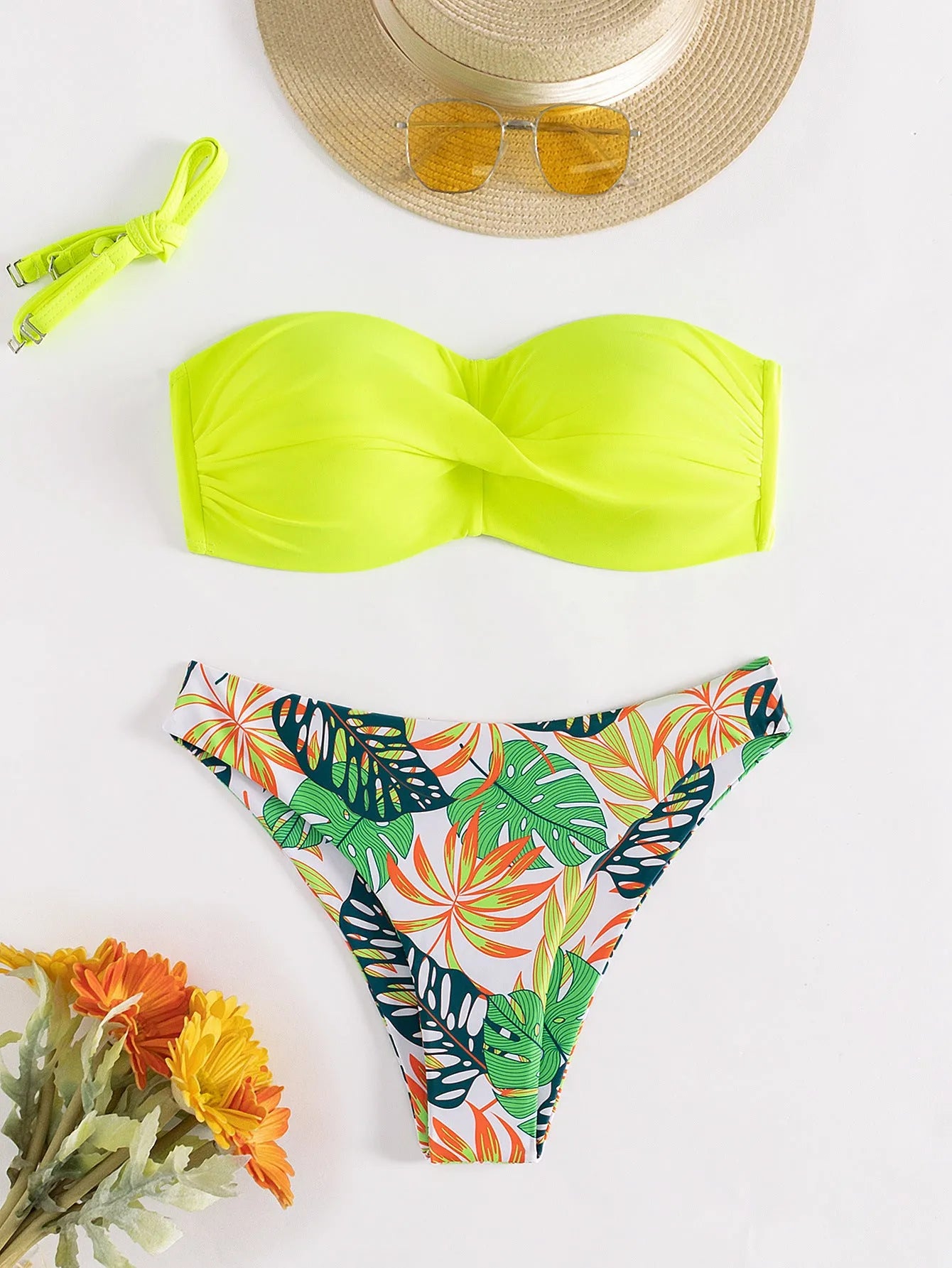 Green split push up bikini set with briefs bottom on a mannequin