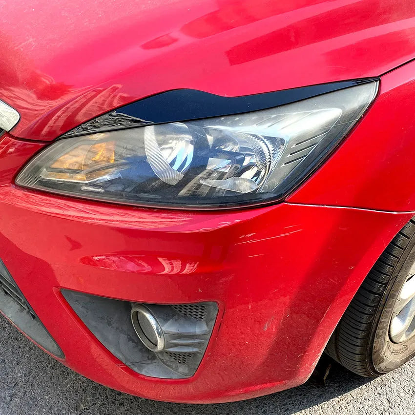 Ford Focus headlight eyebrow sticker set in carbon fibre pattern and piano black finish