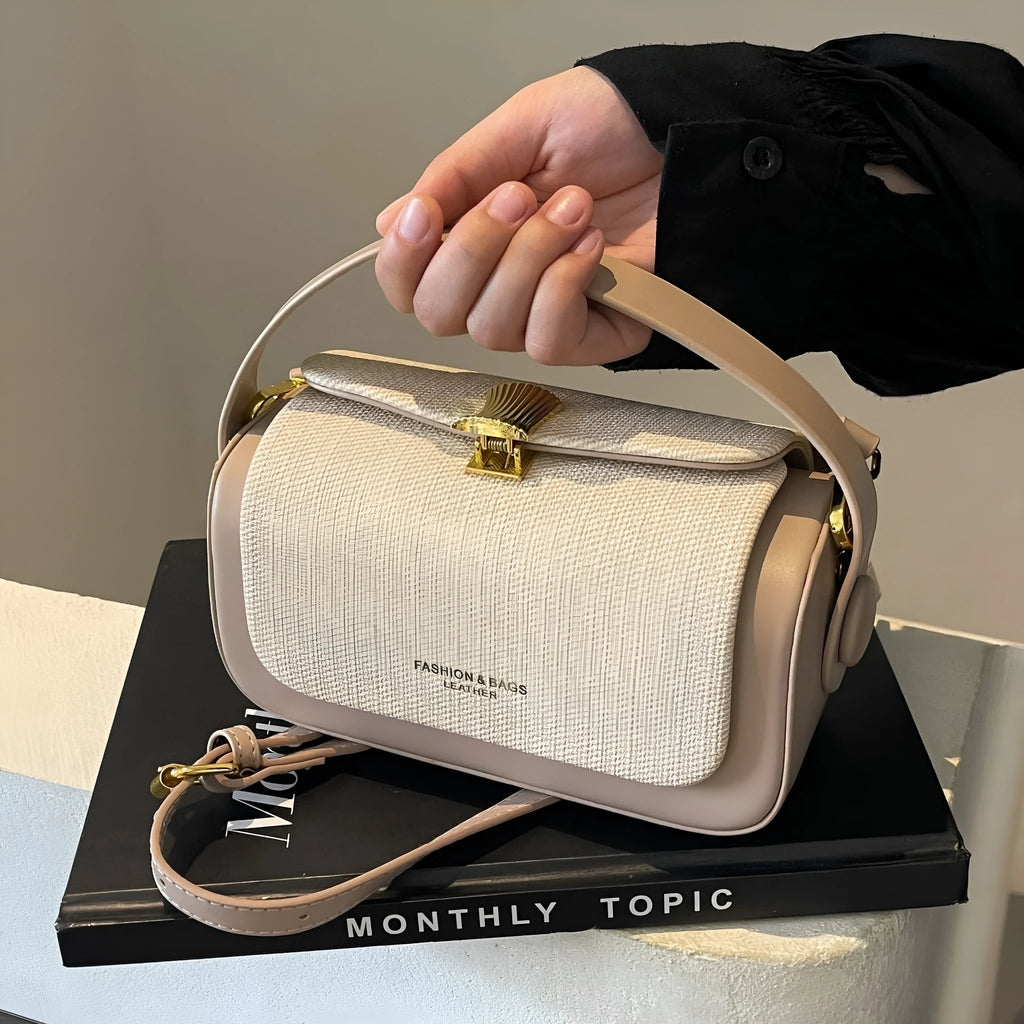Women's PU leather messenger bag in horizontal square design with contrast stitching