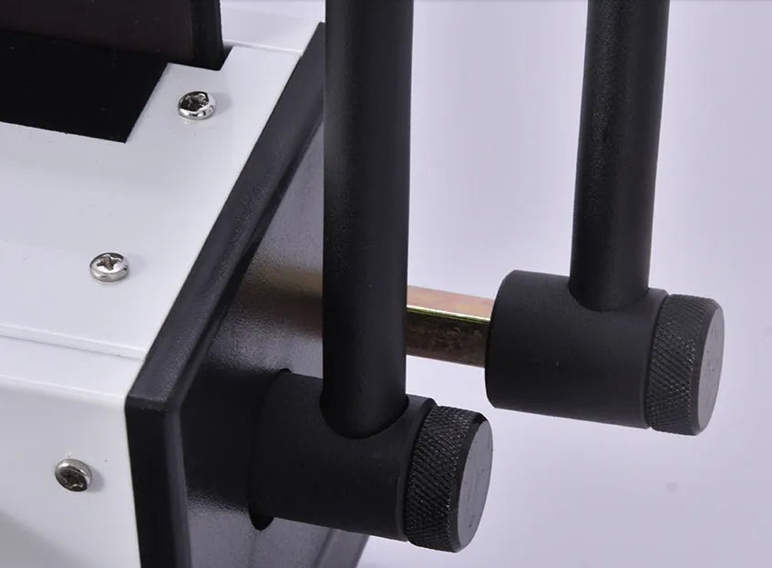 Leisheng 34-hole black manual iron ring binding machine on desk with paper