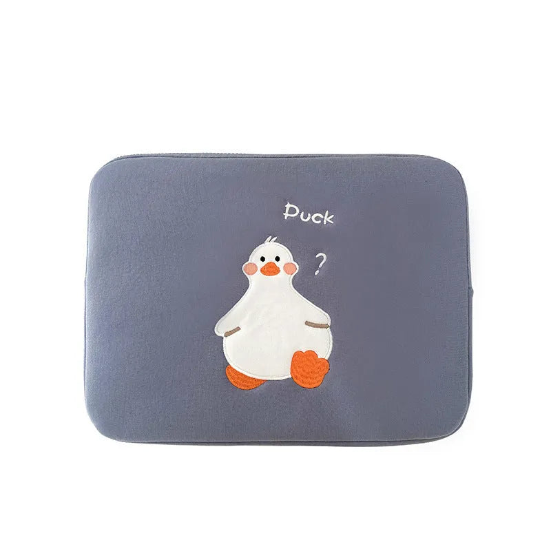 Blue cotton tablet case with an embroidered cartoon duck design and a silver zip closure.