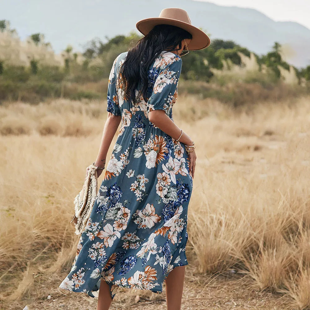 Women's floral summer dress with V neck, short sleeves, elastic waist and large hemline mid-length skirt