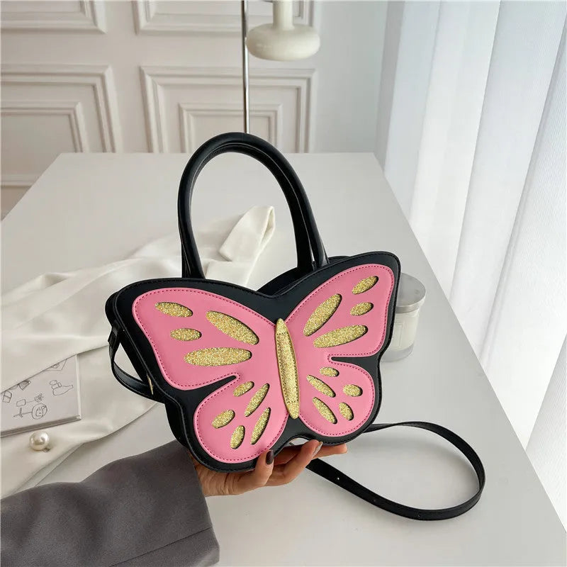 Small square PU crossbody shoulder bag in black with contrast colour detailing.