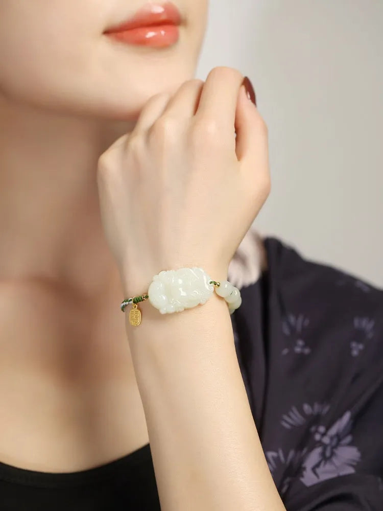 Year of Rabbit Chinese zodiac bracelet with Hetian jade charm, S925 silver card, and red ice cotton rope.
