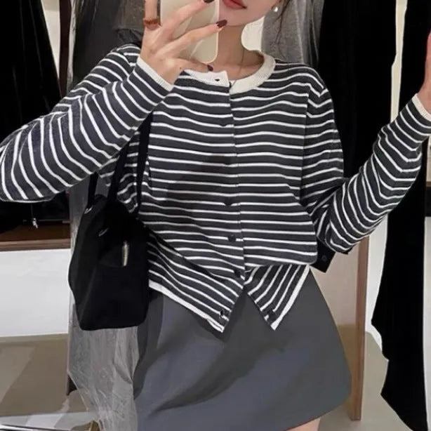 Dark grey and white striped women's cardigan coat with long sleeves and a slim, short fit.