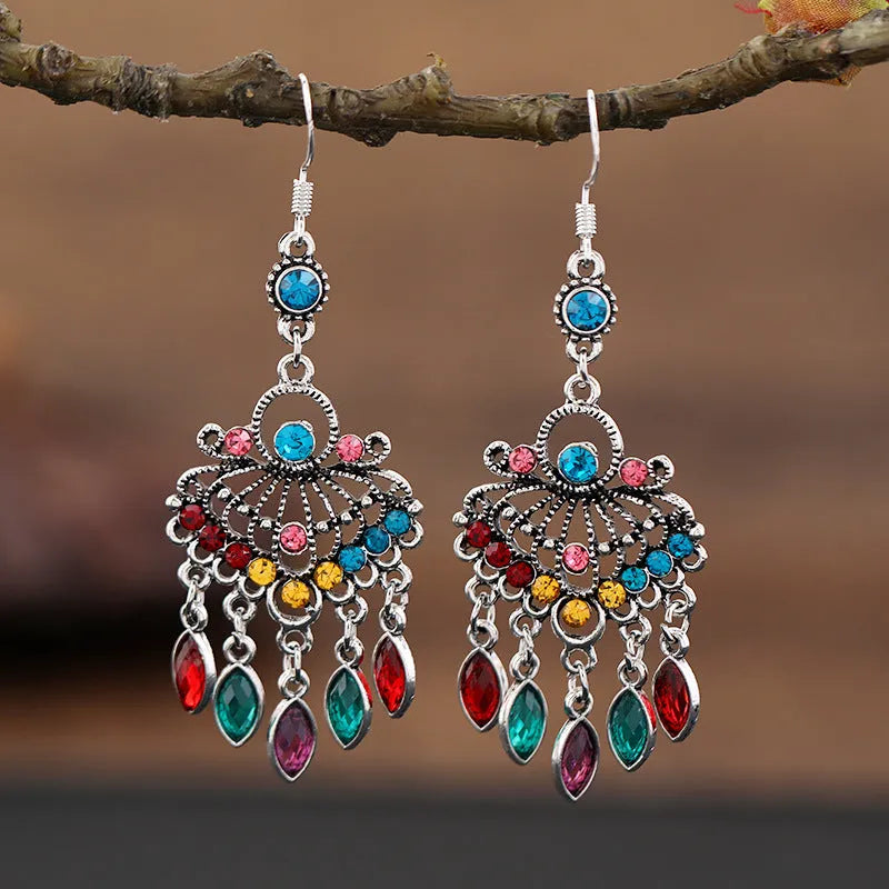 Retro long drop earrings with purple crystal fringes on an alloy setting.