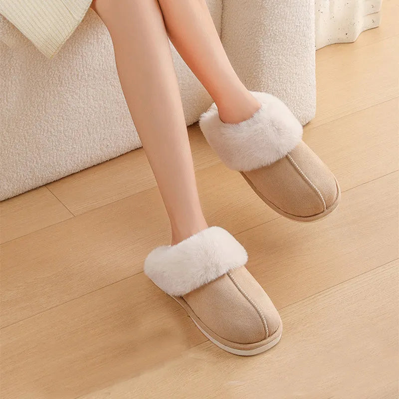 Women's brown plush indoor slippers with a round toe, flat heel, and a textured PVC sole.