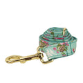 Fabric dog collar set with rose pattern detachable bow, matching leash, and optional vest in green background