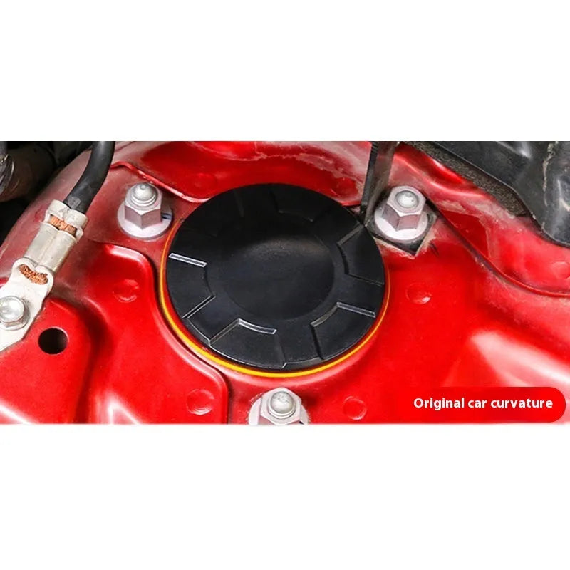 Black pair of model 20 suspension covers for Axela shock absorber screw protection