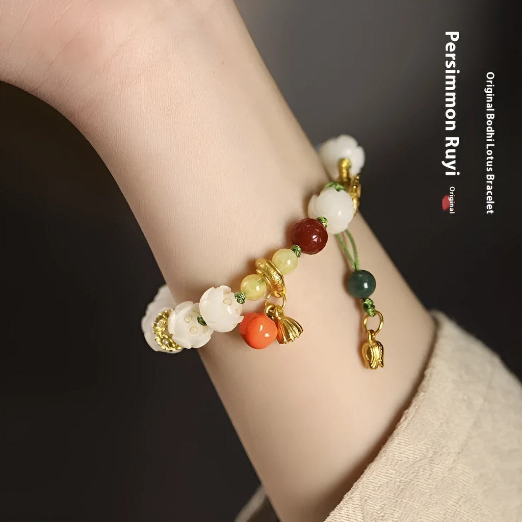 Hand-woven white jade bodhi bracelet with lotus and large pumpkin beads on a single ring open rope.
