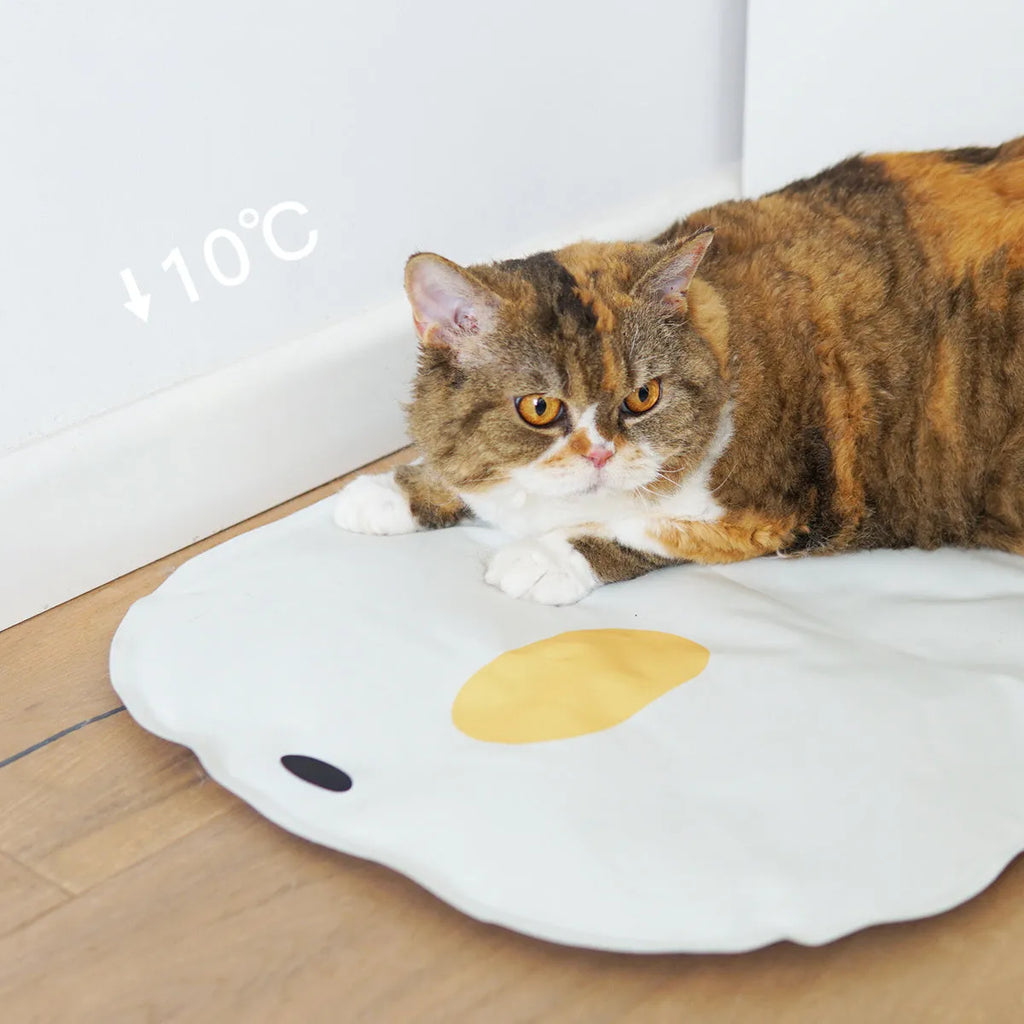 Washable chick-shaped pet cooling mat measuring 45cm by 45cm with composite cloth construction