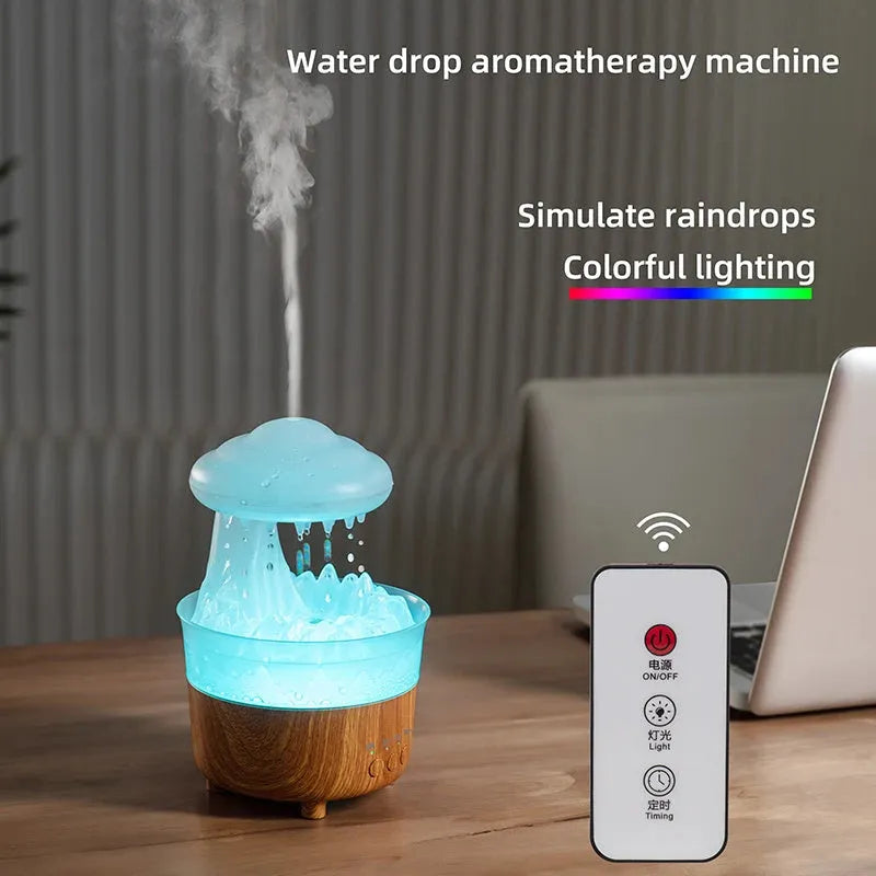 Wood grain white column-shaped rain cloud humidifier diffuser with LED night light on a table.