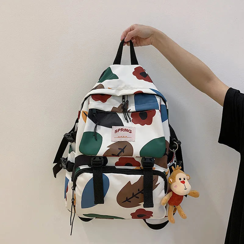 Mori style contrast colour nylon travel backpack for students, geometric pattern, black colour, 20-35L capacity