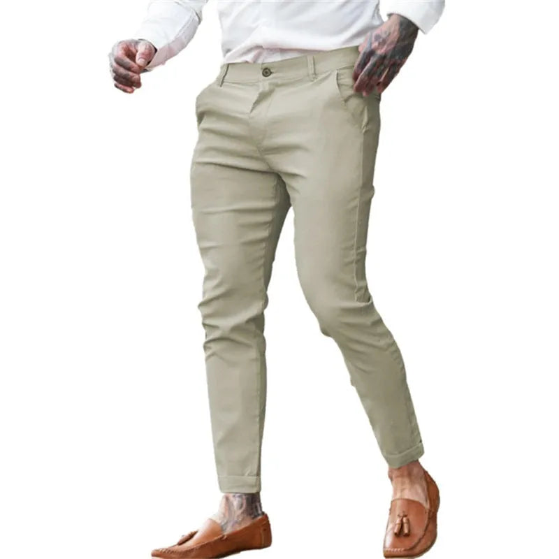 Men's slim fit pencil pants in twill cotton stretch fabric shown in a solid colour.