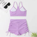 Women's high waist split bikini swimsuit in black or purple, made from nylon and spandex.