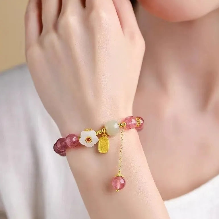 Handmade strawberry quartz crystal bracelet with Hetian jade peach blossom accents in natural style