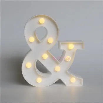 White plastic LED marquee letter sign with warm white glow, 22cm tall