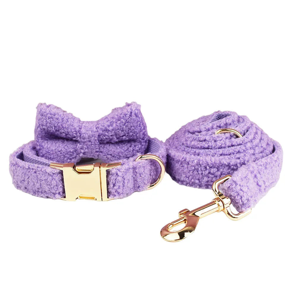 Four-piece dog clothing set showing collar, leash, vest and bow tie for small pets