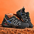 Men's grey orange and dark blue casual running shoes with low-top design on a white background.