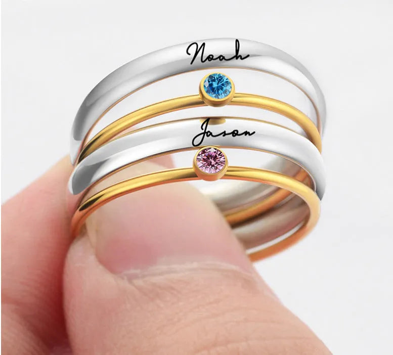 December birthstone ring with engraved geometric pattern and gold electroplated finish on titanium steel band.