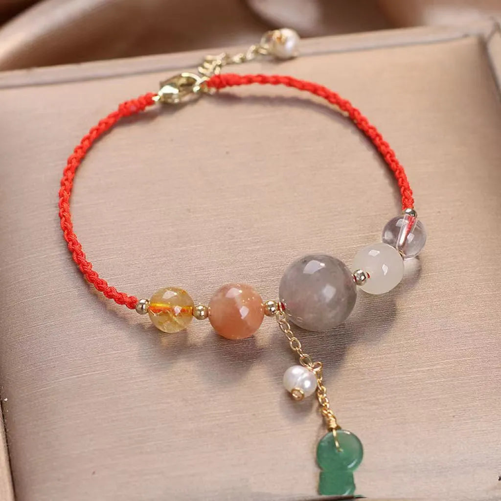 Hand-woven crystal sequin peace buckle bracelet for women in red, green, and blue colour options