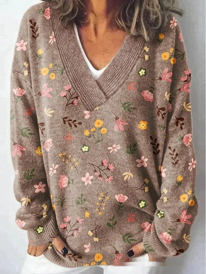 Women's V-neck long sleeve sweatshirt with a raised 3D floral printed pattern in a retro art style.