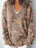 Women's V-neck long sleeve sweatshirt with a raised 3D floral printed pattern in a retro art style.