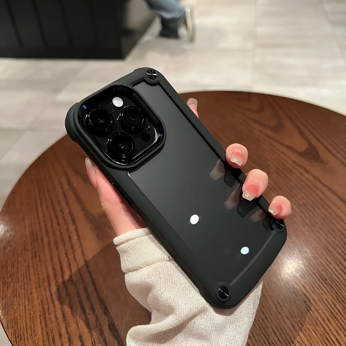 Super Shatterproof Transparent Acrylic Phone Case for iPhone 17 in black, front view showing fall protection
