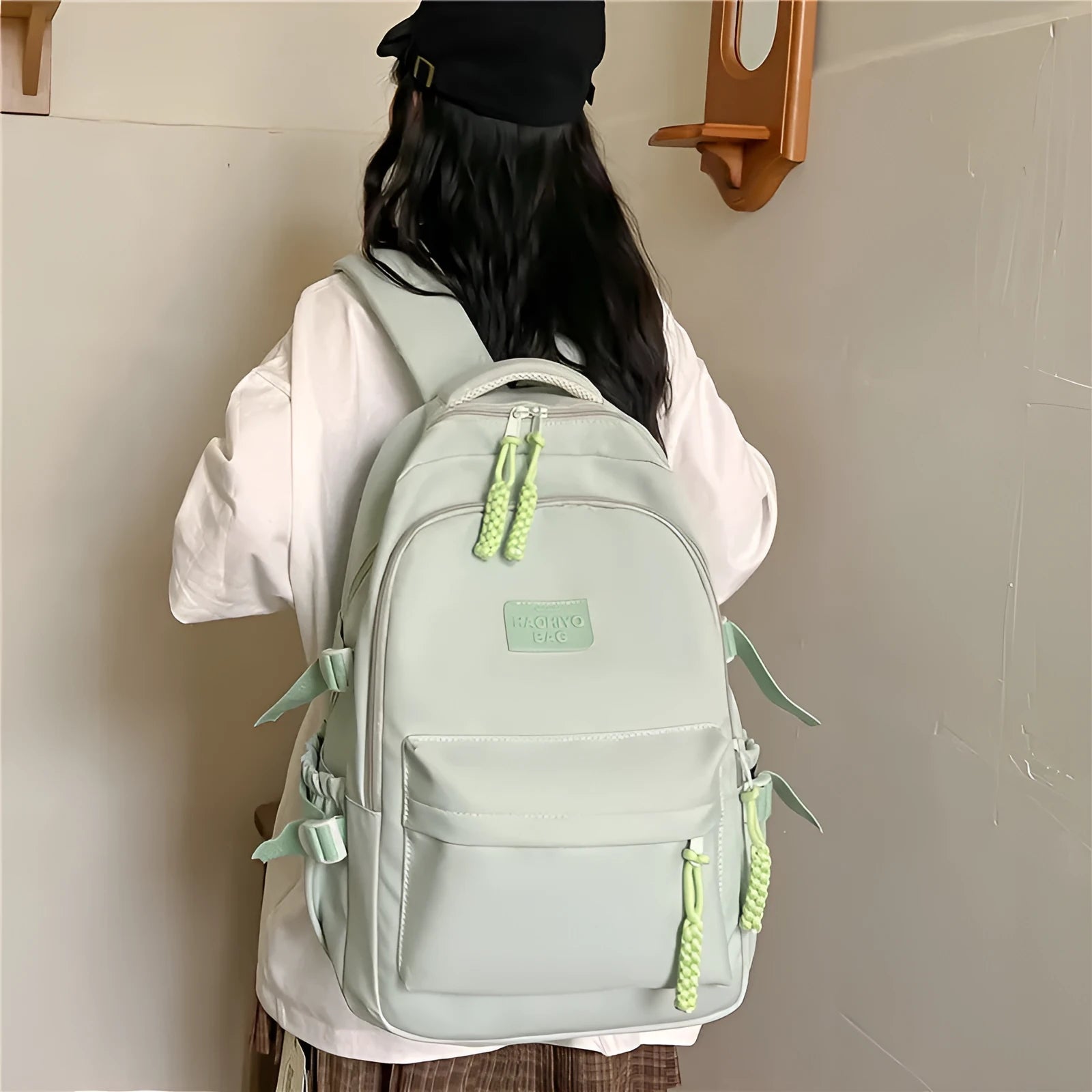 Korean-style lightweight nylon waterproof school backpack in beige with curved shoulder strap