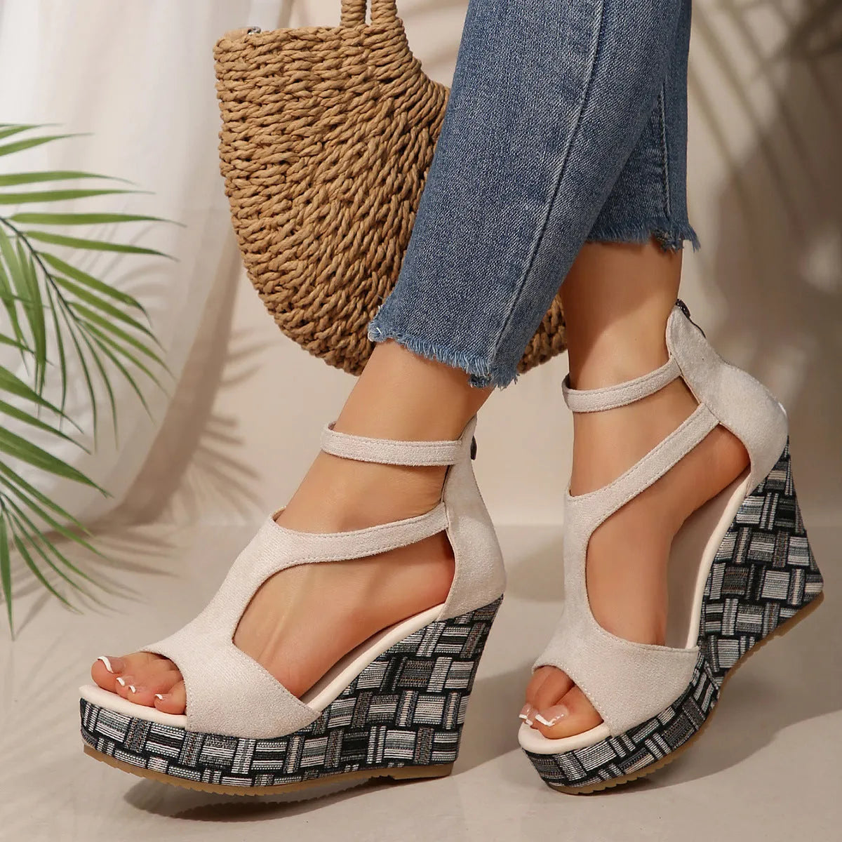 Women's cream white ankle-strap sandals with a buckle and thick rubber sole, shown from the side.