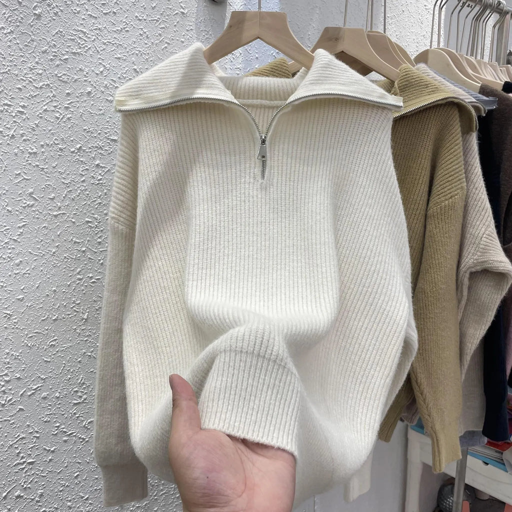 Women's loose fit pullover sweater with polo collar in soft viscose knit, solid colour, available in seven shades