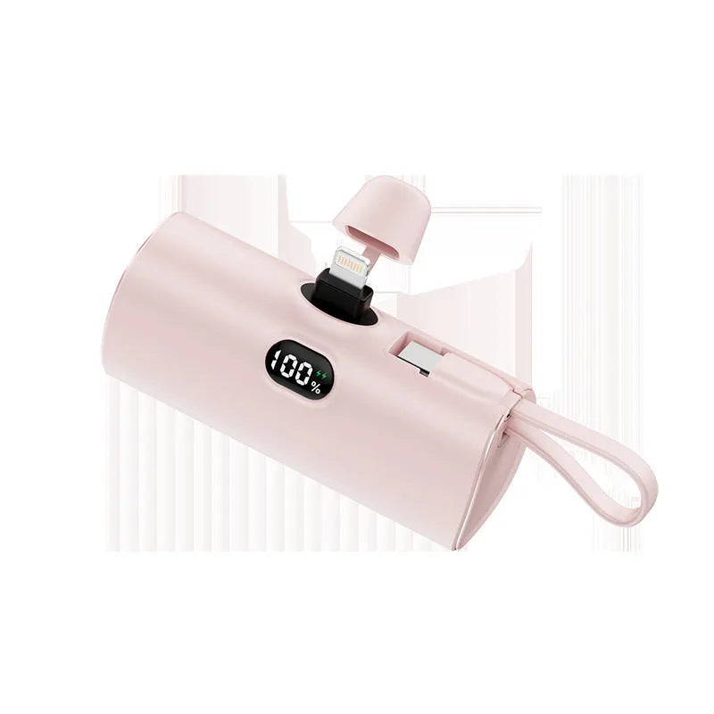 Capsule-shaped digital display wireless power bank in multiple colours with built-in plug.