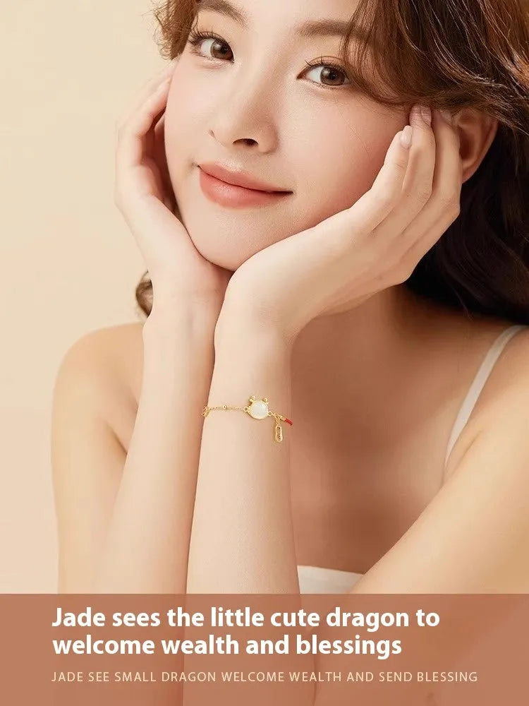 Silver-plated dragon bracelet on a wrist, showcasing the detailed zodiac motif and electroplated finish.