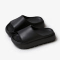 Women's thick-soled beach slippers in beige with a textured EVA sole.