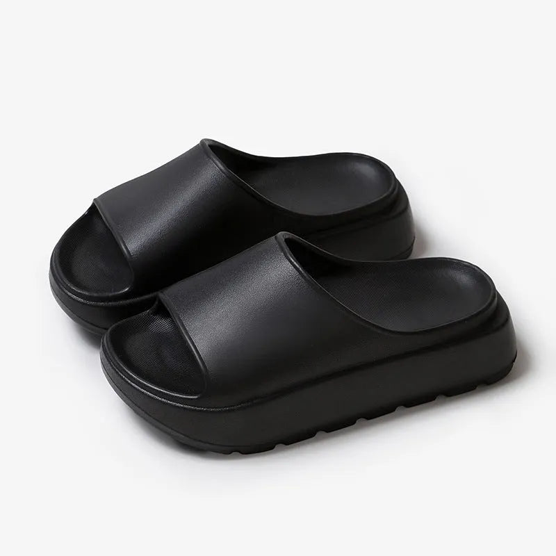 Women's thick-soled beach slippers in beige with a textured EVA sole.