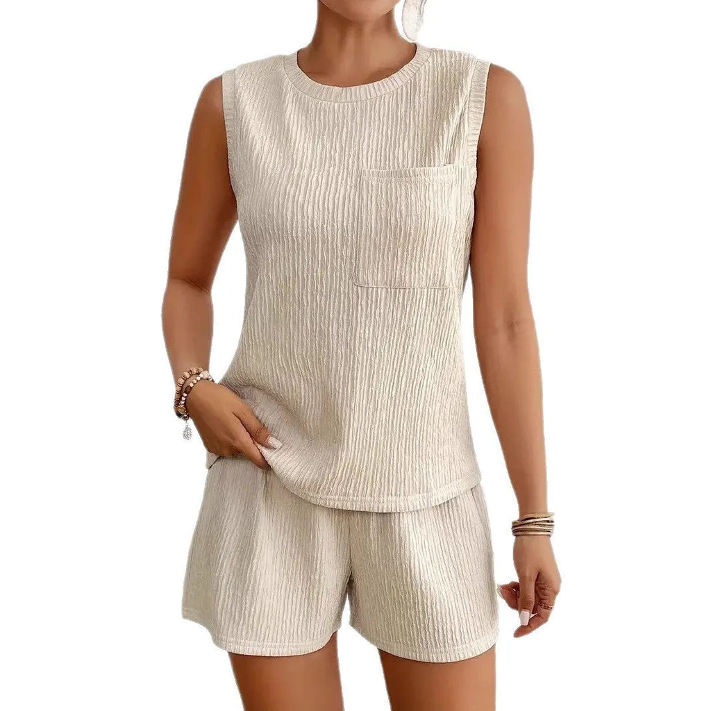 Solid colour women's sleeveless vest and shorts lounge set in apricot or orange polyester fabric