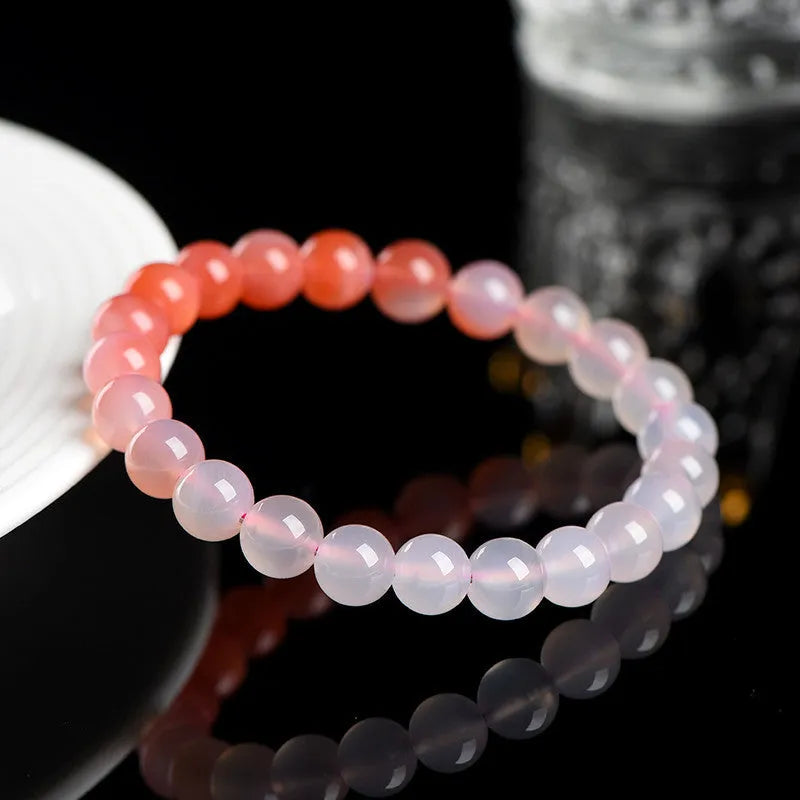 Natural gradient Yanyuan agate bracelet showing geometric beads in a salt source colour tone.
