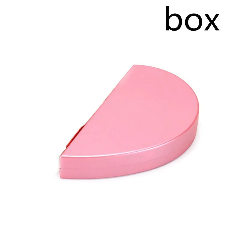 Red rotating 3D heart-shaped plastic ring box with a rose, open to show ring placement.