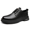 Men's black retro casual shoes with round toe, flat square heel, and decorative stitching on the PU upper.