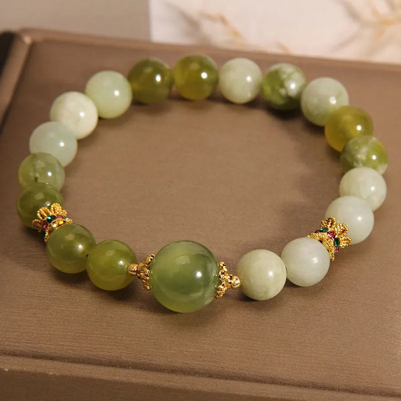 Xiuyan jade women's bracelet in jade green colour with original design.
