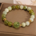 Xiuyan jade women's bracelet in jade green colour with original design.