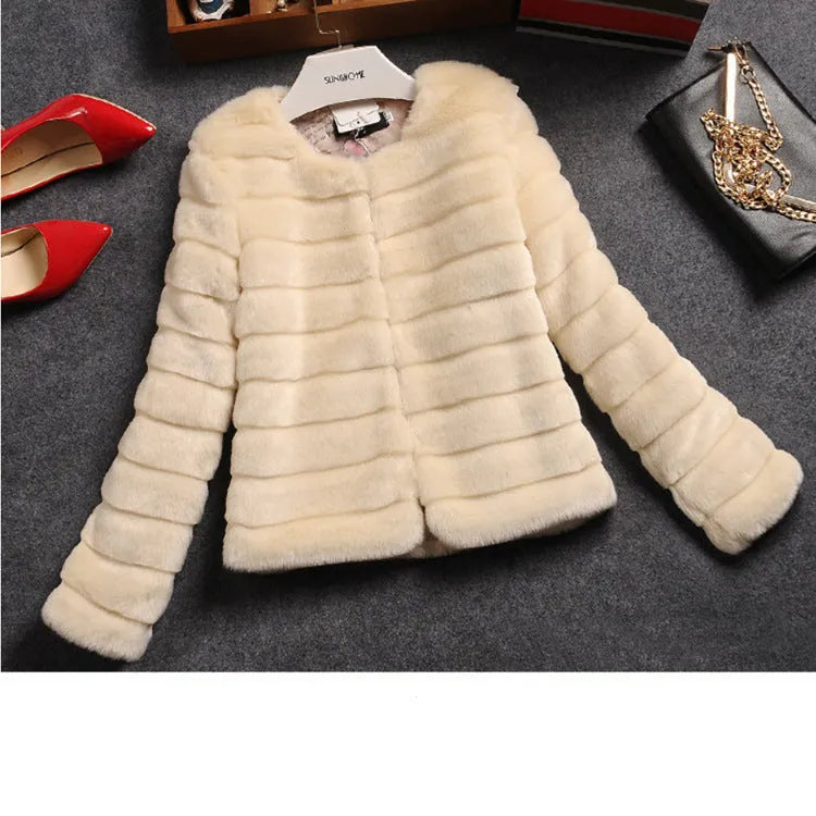 Women's short-length faux fur top in beige, shown on a model.