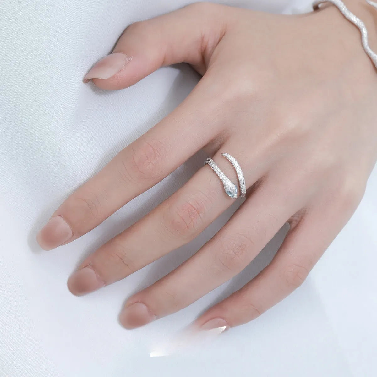 Adjustable snake ring women's jewellery with electroplated silver construction and white gold colour finish