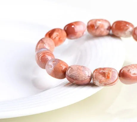 Natural cherry agate barrel bead bracelet with geometric shape and ruyi design elements