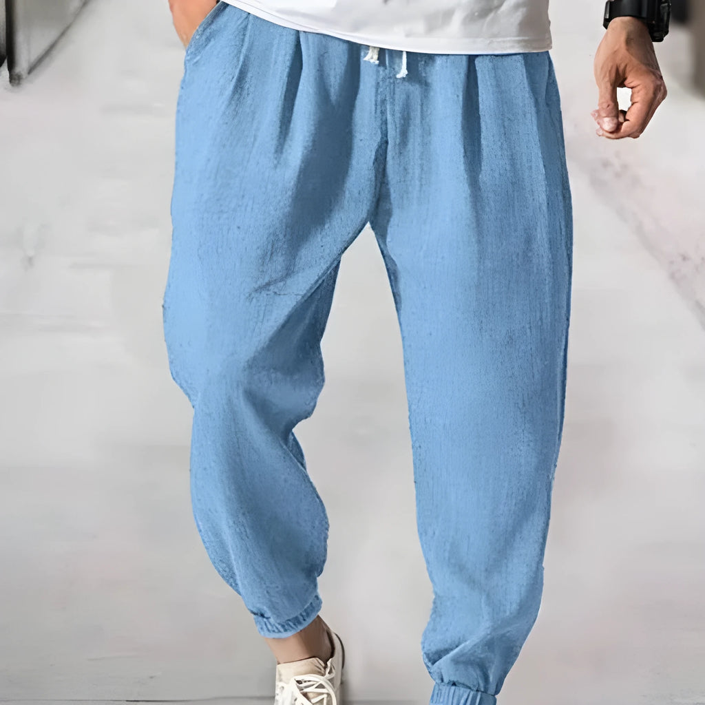 Men's casual cotton banded ankle pants in loose summer fit showing seven colour options