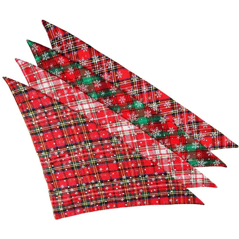 Cotton triangular dog scarf with plaid pattern in Christmas colours, 44x44cm, placed on a dog